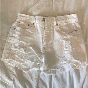 white ripped jean shorts